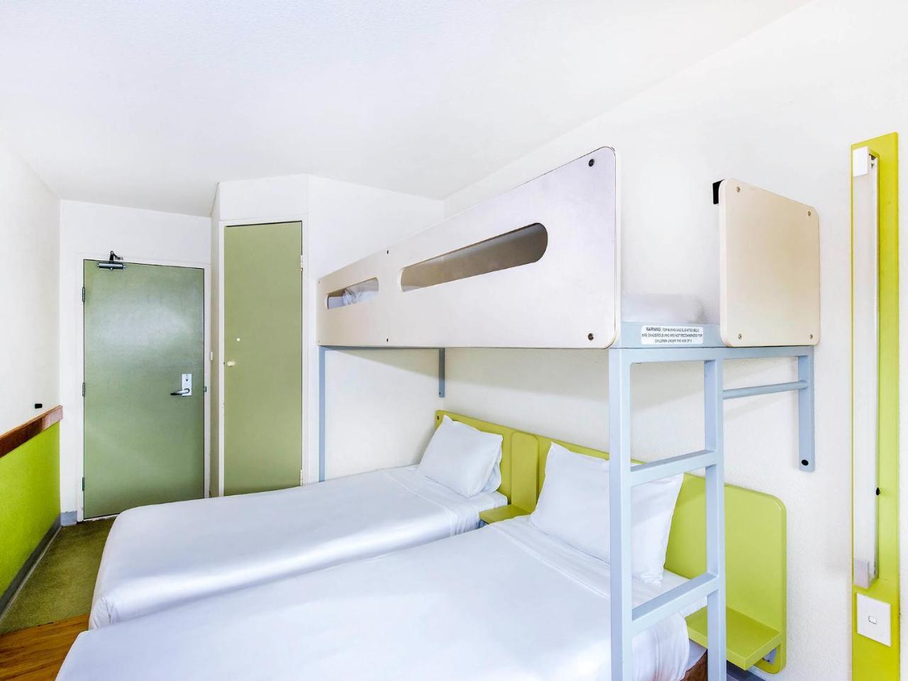 Standard Room with Two Single King Beds and Overhead Bunk